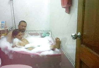 Chunky Indian housewife with Her Spouse In the bath