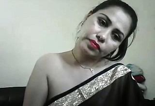 Hot desi girl on cam showing Boobs And teasing in a Saree Wi